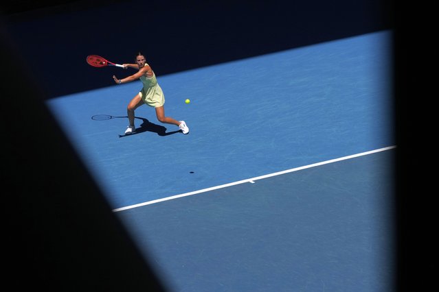 Emma Navarro of the U.S. plays a forehand return to Ons Jabeur of Tunisia during their third round match at the Australian Open tennis championship in Melbourne, Australia, Saturday, January 18, 2025. (Photo by Manish Swarup/AP Photo)