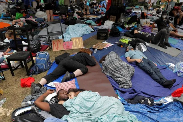 Demonstrators relax inside of an area being called the “City Hall Autonomous Zone” that has been established to protest the New York Police Department and in support of “Black Lives Matter” near City Hall in lower Manhattan, in New York City, U.S., June 30, 2020. (Photo by Lucas Jackson/Reuters)