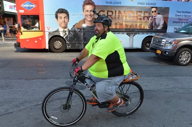 Eric Hites, a 563-pound man behind website and blog “Fat Guy Across America”, attempting to cross the continental U.S. on bicycle to win back his estranged wife and get himself into shape arrives in New York City at Times Square on September 23, 2015 in New York City. (Photo by Slaven Vlasic/Getty Images)