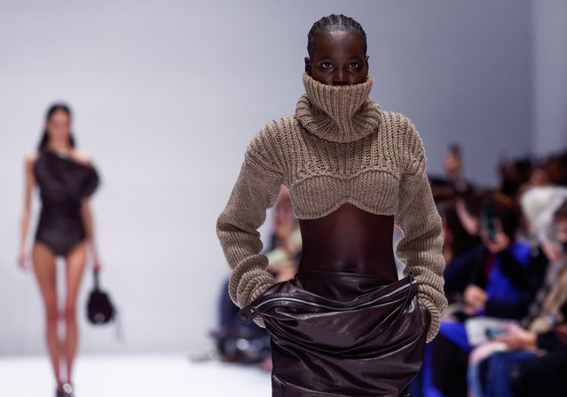 A model presents a creation by designer Jonny Johansson as part of his Fall-Winter 2024/2025 Women's ready-to-wear collection show for fashion brand Acne Studios during Paris Fashion Week in Paris, France, on February 28, 2024. (Photo by Gonzalo Fuentes/Reuters)
