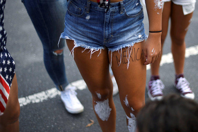 Allie Labutis wears a painted “Merica” on her thigh during the fifth annual Made in America Music Festival in Philadelphia, Pennsylvania September 3, 2016. (Photo by Mark Makela/Reuters)