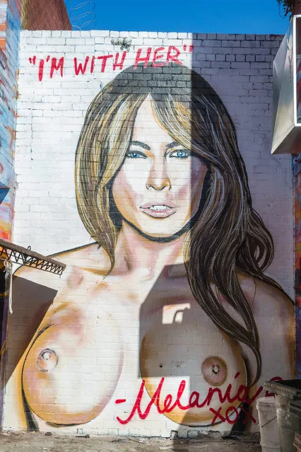 A mural of a topless Melania Trump has been painted on an alley way wall in Melbourne, 2016. A mural of Donald Trump's wife, Melanie Trump, has been painted on a a wall in Collingwood, an inner city suburb of Collingwood. The mural was painted be local graffiti artist “Lush Sux” and shows a topless Melanie Trump with “I'm With Her” written up the top, and Melania xo written underneath. (Photo by Splash News and Pictures)