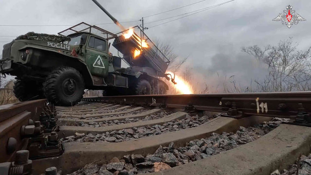 In this photo taken from video and released by Russian Defense Ministry Press Service on Thursday, February 8, 2024, a rocket is fired from the Russian army's Grad rocket launchers at an undisclosed location in Ukraine. (Photo by Russian Defense Ministry Press Service via AP Photo)