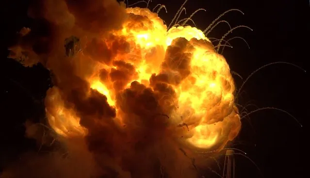 An unmanned Antares rocket is seen exploding seconds after lift off from a commercial launch pad in this still image from video shot by Matthew Travis of Zero-G News from the press area at Wallops Island, Virginia October 28, 2014. The 14-story rocket, built and launched by Orbital Sciences Corp, bolted off its seaside launch pad at the Wallops Flight Facility at 6:22 p.m. EDT/22:22 GMT. (Photo by Matthew Travis/Reuters/Zero-G News)