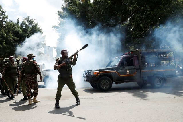 Riot police officers fire teargas canisters as they attempt to disperse protesters demonstrating against the death of a blogger in police custody last week, in downtown Nairobi, Kenya on June 12, 2025. (Photo by Thomas Mukoya/Reuters)