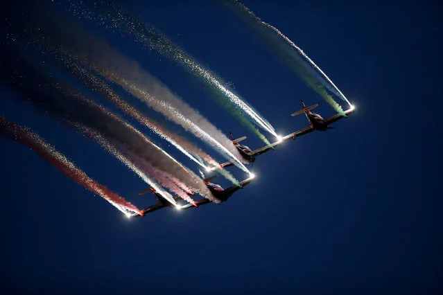 The Pioneer Team, a civil aerobatic team from Italy, let off pyrotechnics from their Pioneer 330 aircraft during the Malta International Airshow off SmartCity Malta, outside Valletta, Malta, September 24, 2016. (Photo by Darrin Zammit Lupi/Reuters)