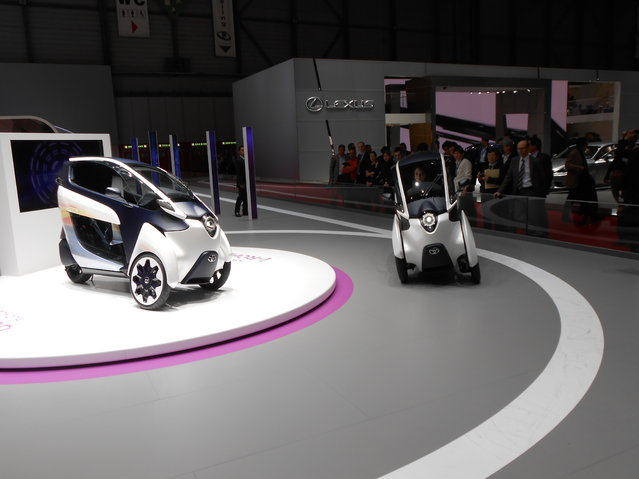 Toyota revealed its i-Road concept, a three-wheeled all-electric motorcycle of sorts that seats two. The unique design is only 33 inches wide, which would make it tops in buzzing in through and around traffic. An Active Lean system tilts the i-Road through corners like a motorbike, while the cabin (which seats two in a tandem layout) is fully enclosed. Maximum range is about 30 miles. (Photo by Luis Fernando Ramos/G1)