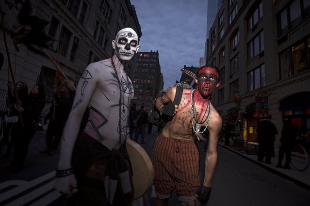 Revelers take part in the Greenwich Village Halloween Parade in the Manhattan borough of New York, October 31, 2015. (Photo by Carlo Allegri/Reuters)
