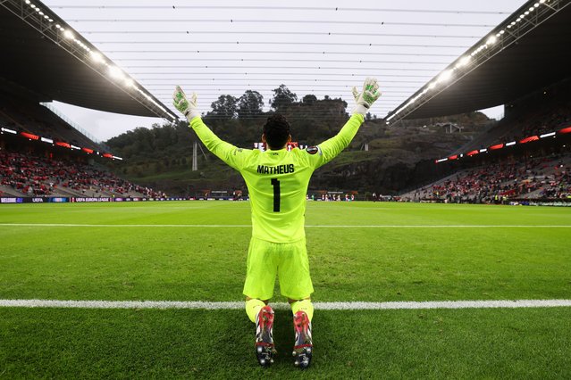 Red Star's goalkeeper Matheus, a former Braga player, kneels down on the goal line before the Europa League opening phase soccer match between SC Braga and Red Star Belgrade in Braga, Portugal, Thursday, October 23, 2025. (Photo by Luis Vieira/AP Photo)