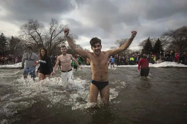 Participants take part in Courage Polar Bear Dip at Coronation Park in Oakville, January 1, 2015. (Photo by Mark Blinch/Reuters)
