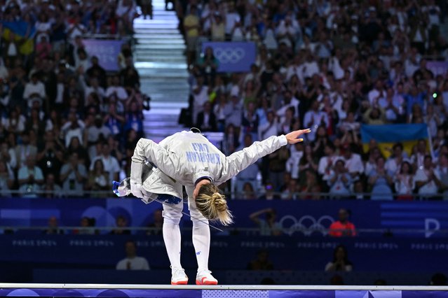 Ukraine's Olga Kharlan celebrates after winning against South Korea's Choi Se-bin in the women's sabre individual bronze medal bout during the Paris 2024 Olympic Games at the Grand Palais in Paris, on July 29, 2024. (Photo by Fabrice Coffrini/AFP Photo)