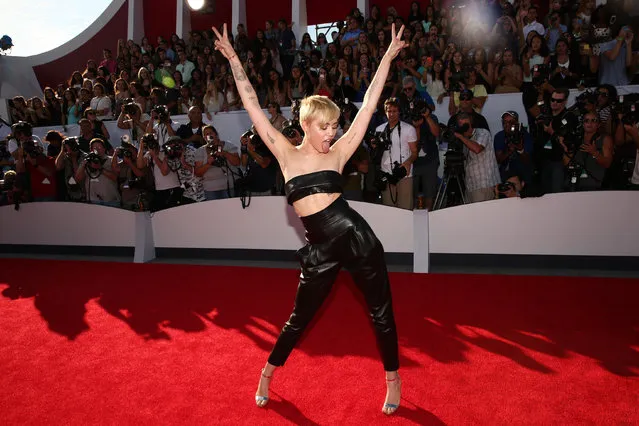 American singer-songwriter Miley Cyrus attends the 2014 MTV Video Music Awards at The Forum on August 24, 2014 in Inglewood, California.  (Photo by Christopher Polk/Getty Images for MTV)