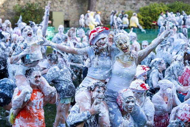 Students take part in the traditional Raisin Monday foam fight on St Salvator's Lower College Lawn at the University of St Andrews in Fife, UK on Monday, October 21, 2024. (Photo by Jane Barlow/PA Images via Getty Images)