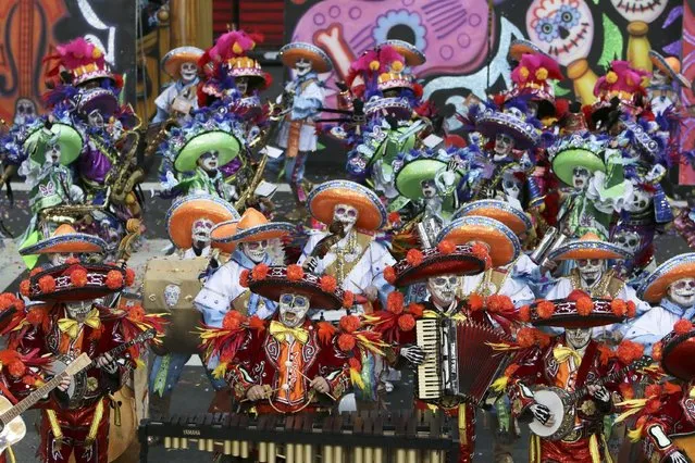 Members of the South Philadelphia String Band perform during the 116th annual Mummers Parade in Philadelphia on Friday, January 1, 2016. (Photo by Joseph Kaczmarek/AP Photo)