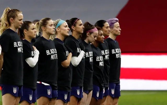 The U.S. players line up during the national anthems before their match against international soccer friendly match against France wearing t-shirts in support of the Black Lives Matter campaign in Le Havre, France on April 13, 2021. (Photo by Benoit Tessier/Reuters)