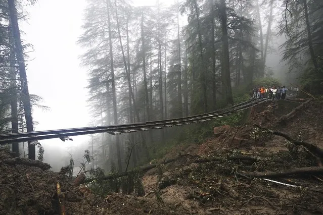 A portion of the Shimla-Kalka heritage railway track that got washed away following heavy rainfall on the outskirts of Shimla, Himachal Pradesh state, Monday, August 14, 2023. Heavy monsoon rains triggered floods and landslides in India's Himalayan region, leaving more than a dozen people dead and many others trapped, officials said Monday. (Photo by Pradeep Kumar/AP Photo)