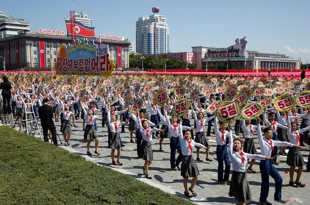 Participants march during a parade for the 70th anniversary of North Korea's founding day in Pyongyang, North Korea, Sunday, September 9, 2018. (Photo by Kin Cheung/AP Photo)