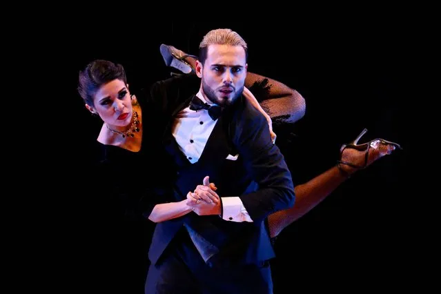 Tango dancers Susana Ocampo (L) and David Figueroa compete in the final round of Stage category of the World Tango Championship in Buenos Aires on September 2, 2023. The Tango World Festival and Championship, which brings together thousands of Tango music lovers from different parts of the world every year, is being held in the Argentine capital Buenos Aires and runs until September 3. (Photo by Luis Robayo/AFP Photo)