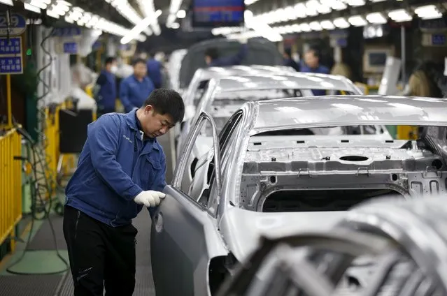 A worker works at an assembly line of Hyundai Motor's plant in Asan, South Korea, January 27, 2016. (Photo by Kim Hong-Ji/Reuters)