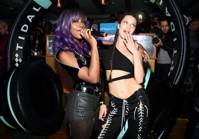 Justine Skye and Bella Hadid at The Gilded Lily after party for the release of Bella Hadid Paper Magzine cover on December 16, 2016 in New York City. (Photo by Spaulding/BFA/Rex Features/Shutterstock)