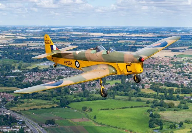 Picture dated August 6th, 2023 shows 103-year-old former Wren Officer Christian Lamb flying in a Miles Magister plane 80 years after she was offered a lift home from a party in one by a Polish officer. A 103-year-old former Wren Officer in WW2 has taken to the skies in a Miles Magister plane – 80 years after she was offered a lift home from a party in one by a Polish officer. Christian Lamb, who is one of the last surviving WW2 Wren Officers, looked thrilled as she soared into the air in the two-seater training aircraft – eight decades after hitching a lift in one when she missed her train. Mrs Lamb, who lives in London, was watched by her family and friends as she re-lived her daring flight at the Shuttleworth Trust “Circus” Air Show. (Photo by Darren Harbar/Bav Media)