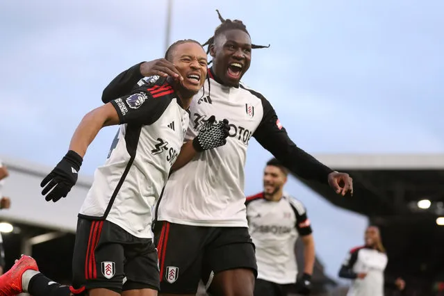 Bobby De Cordova-Reid of Fulham celebrates his goal with Calvin Basse during the Premier League match between Fulham FC and Arsenal FC at Craven Cottage on December 31, 2023 in London, England. (Photo by Jacques Feeney/Offside/Offside via Getty Images)