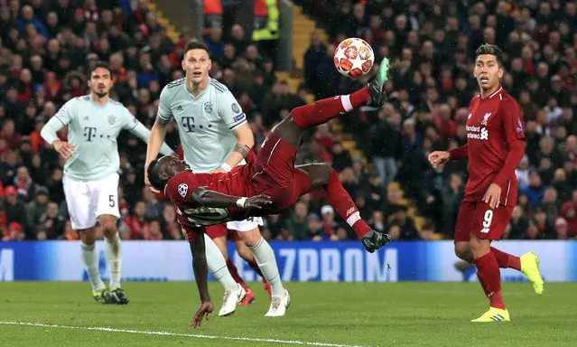 Liverpool's Sadio Mane attempts an overhead kick, during the Champions League round of 16 first leg soccer match between Liverpool and Bayern Munich,  at Anfield, in Liverpool, England, Tuesday, February 19, 2019. (Photo by Peter Byrne/PA Wire via AP Photo)