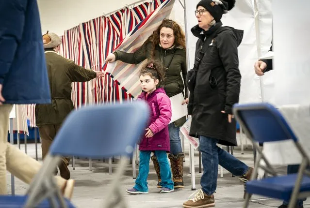 On the day of the New Hampshire primary, New Hampshire voters exit the voting booth after voting at Londonderry High School in Londonderry, New Hampshire on Tuesday January 23, 2024. (Melina Mara/The Washington Post)