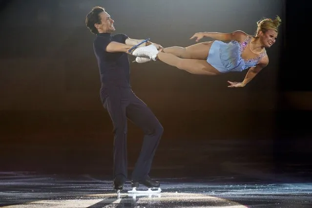 Kirsten Moore-Towers and Michael Marinaro of Canada skate during the exhibition gala at Skate Canada International in Vancouver, British Columbia on October 31, 2021. (Photo by Geoff Robins/AFP Photo)