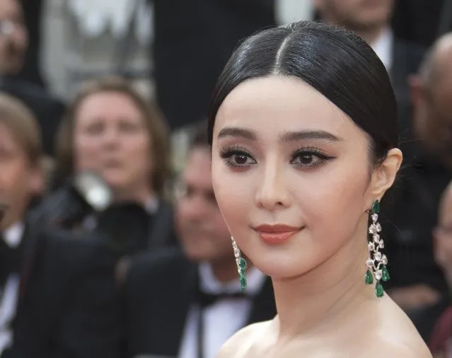 Actress Fan Bingbing poses on the red carpet as she arrives for the opening ceremony and the screening of the film “La tete haute” out of competition during the 68th Cannes Film Festival in Cannes, southern France, May 13, 2015. (Photo by Yves Herman/Reuters)