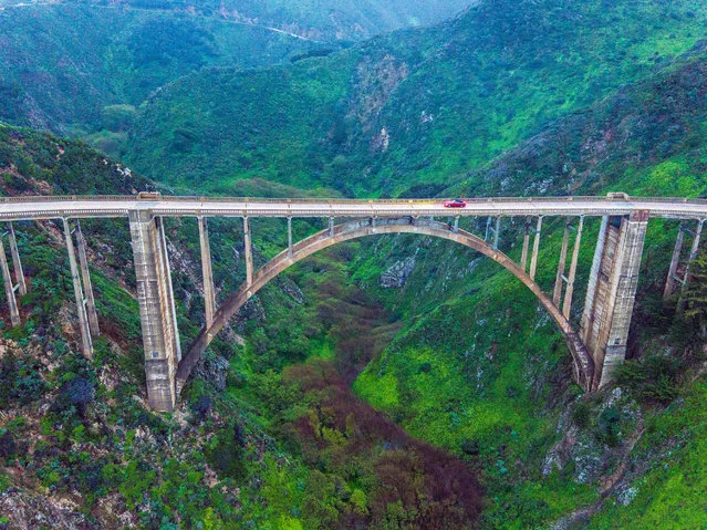 The drama of Bixby Creeks famous deck arch bridge has inspired countless car commercials. (Photo by Chase Guttman/Caters News)