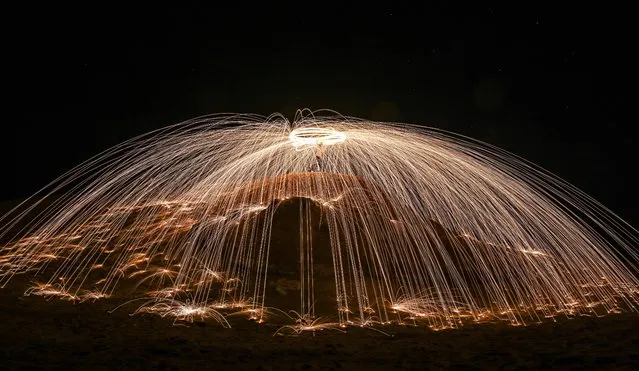 Photo taken on November 5, 2021 shows a steel wool firework show in Jahra Governorate, Kuwait. (Photo by Xinhua News Agency/Rex Features/Shutterstock)