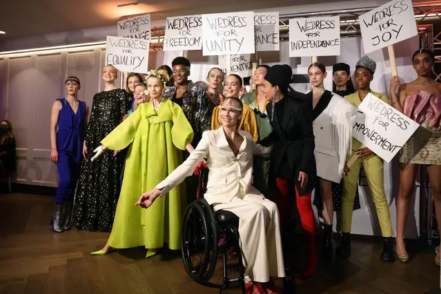 A model in a wheelchair and other models present fashion at the Opening Show by Eyecandy Frankfurt & WeDress Collective at Frankfurt Fashion Week January 2022 at Sofitel Frankfurt Opera on January 19, 2022 in Frankfurt am Main, Germany. (Photo by Andreas Rentz/Getty Images)