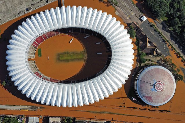 Aerial view of the flooded Beira-Rio Stadium on May 6, 2024 in Porto Alegre, Brazil. Rescue efforts continue in Porto Alegre due to the floods caused by the heavy rains that have battered Brazilian State of Rio Grande Do Sul. A State of Public Calamity has been called by local government while 281 municipalities have been affected, thousands of people have been displaced and damages in infrastructure cause difficulties to access affected areas or big power outages around the state. (Photo by Max Peixoto/Getty Images)