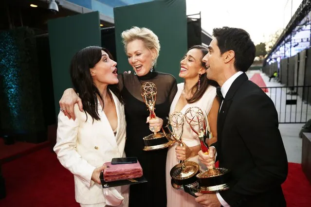 Showrunner Jen Statsky, actor Jean Smart, co-showrunners Lucia Aniello and actor Paul W. Downs with their spoils on the red carpet for the 73rd Annual Emmy Awards in Los Angeles, California on September 19, 2021. (Photo by Al Seib/Los Angeles Times/Rex Features/Shutterstock)