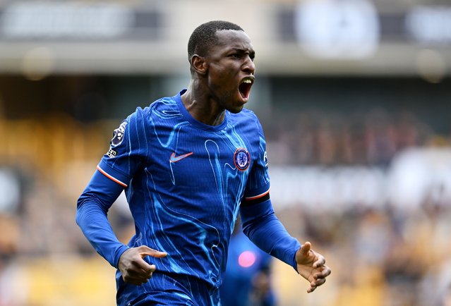 Nicolas Jackson of Chelsea celebrates scoring his team's first goal during the Premier League match between Wolverhampton Wanderers FC and Chelsea FC at Molineux on August 25, 2024 in Wolverhampton, England. (Photo by Darren Walsh/Chelsea FC via Getty Images)