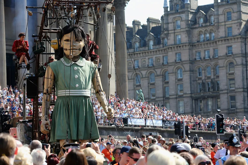 Little Giant Girl Marches through Liverpool