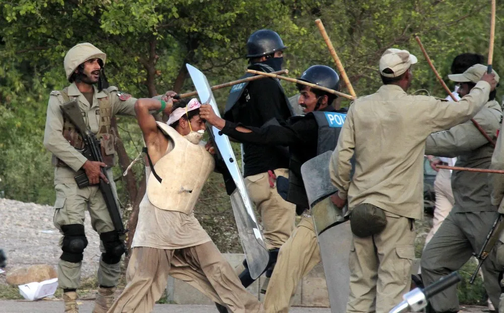Protesters and Police Clash in Pakistan