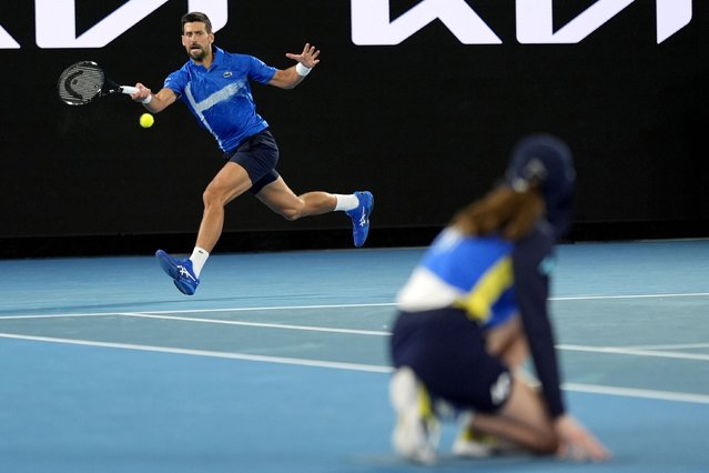 Novak Djokovic of Serbia plays a forehand return to Nishesh Basavareddy of the U.S. during their first round match at the Australian Open tennis championship in Melbourne, Australia, Monday, January 13, 2025. (Photo by Asanka Brendon Ratnayake/AP Photo)
