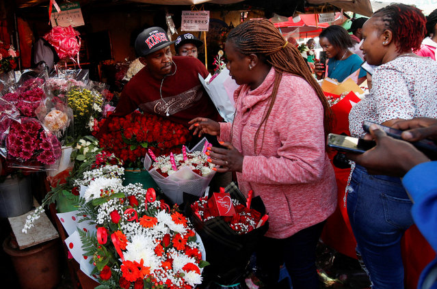 Florists display bouquets for sale to mark Valentine's Day celebrations in Nairobi, Kenya, on February 14, 2025. (Photo by Monicah Mwangi/Reuters)