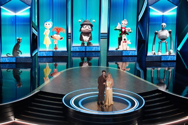 Presenters for Animated Feature, Goldie Hawn and Andrew Garfield, take the stage during the Oscars show at the 97th Academy Awards in Hollywood, Los Angeles, California, U.S., March 2, 2025. (Photo by Chris Pizzello/Invision/AP Photo)