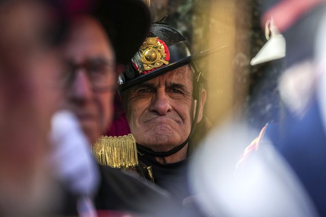 Members of ANPI, the National Association of Italian Partisans, attend a ceremony to commemorate the 81st anniversary of the Ardeatine massacre, a mass killing of 335 civilians and political prisoners carried out by Nazi occupation troops in 1944 in retaliation for an Italian partisan attack on German troops, in Rome, Monday, March 24, 2025. (Photo by Andrew Medichini/AP Photo)