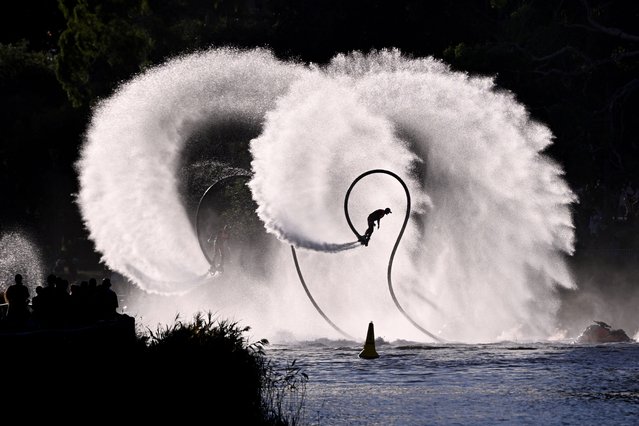 Participants pilot water jet packs on the Yarra River during the annual Moomba Festival in Melbourne on March 10, 2025. (Photo by William West/AFP Photo)