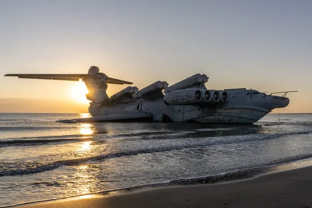 A top-secret Russian seaplane, which never really got off the ground, has been beached as an unofficial oceanside tourist attraction in Derbent, Russian Federation and photographed by photo-reporter Lana Sator in 2022. The futuristic-looking MD-160 Lun class ekranoplan – also known as an Utka – is bigger than a 747 jet and was built as part of the Soviet WIG programme, which dates back to the Cold War 1960s. (Photo by Lana Sator/WENN)