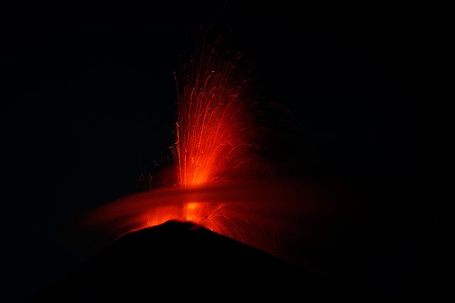 Lava flows down from the crater of the Volcan de Fuego, or Volcano of Fire, in San Juan Alotenango, Guatemala, Thursday, June 5, 2025. (Photo by Moises Castillo/AP Photo)