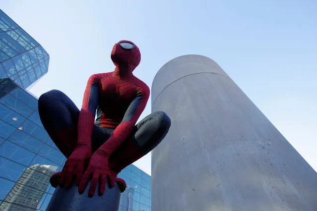 A man in a Spiderman costume poses at New York Comic Con in Manhattan, New York, U.S., October 7, 2016. (Photo by Andrew Kelly/Reuters)