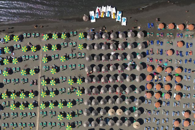 A drone view shows parasols on a beach of the Adriatic Sea in Shengjin, Albania on July 31, 2025. (Photo by Florion Goga/Reuters)