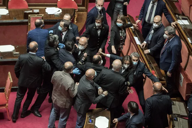 A scuffle over the voting time arrangements of the minutes of yesterday's meeting. League senators slammed into the PD benches during on the subject of security and immigration law the Senato della Repubblica at the Palazzo Madama in Rom, Italy on December 18, 2020. (Photo by Roberto Monaldo/EXPA/laPresse via AP Photo)