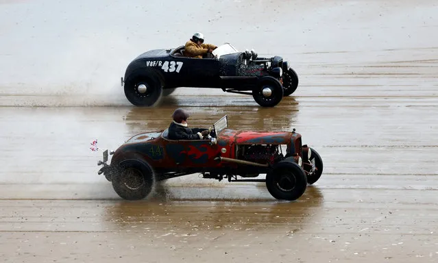 Motoring enthusiasts take part in the “Race The Waves” classic car and motorcycle meet at the beach in Bridlington, Britain on April 22, 2023. (Photo by Lee Smith/Reuters)