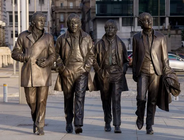 A New Statue of The Beatles by sculptor Andy Edwards is unveiled at Pier Head on December 4, 2015 in Liverpool, England. The bronze sculpture was donated to the city by the Cavern Club and unveiled by John Lennon's sister Julia Baird. (Photo by Richard Stonehouse/Getty Images)